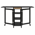 Table pliante de cuisine polyvalente avec étagères intégrées, idéale pour petits espaces